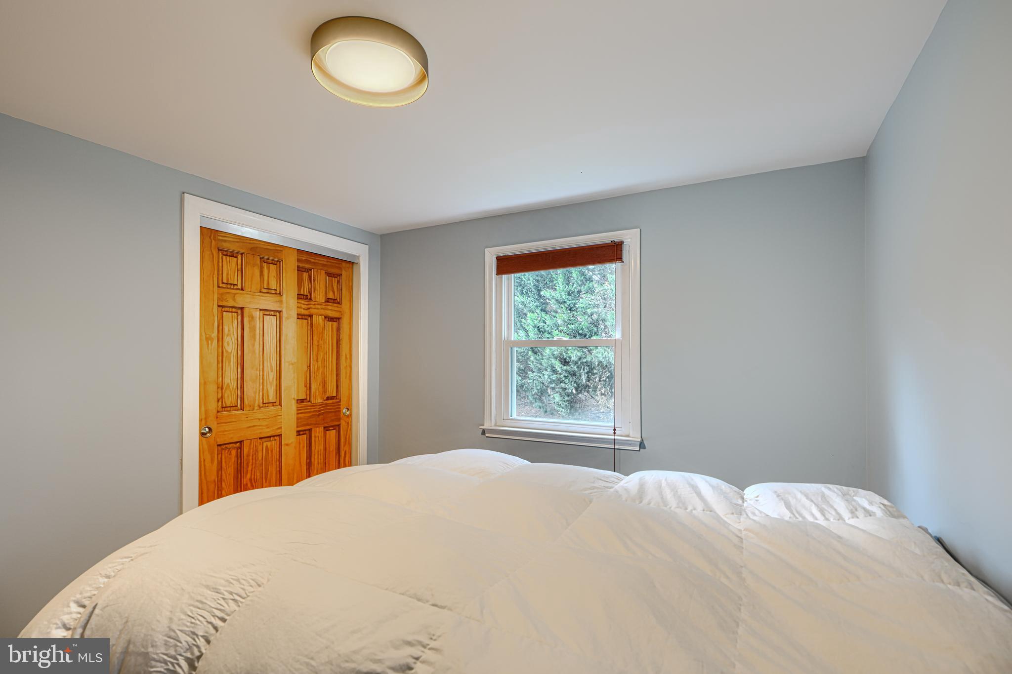 1202 Vermont Road Bel Air, MD 21014 - Photo 48 of 66 a bedroom with a bed and a window