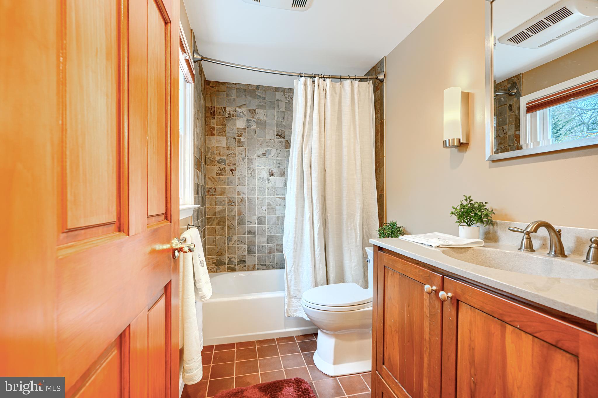 1202 Vermont Road Bel Air, MD 21014 - Photo 50 of 66 a bathroom with a granite countertop sink toilet and shower