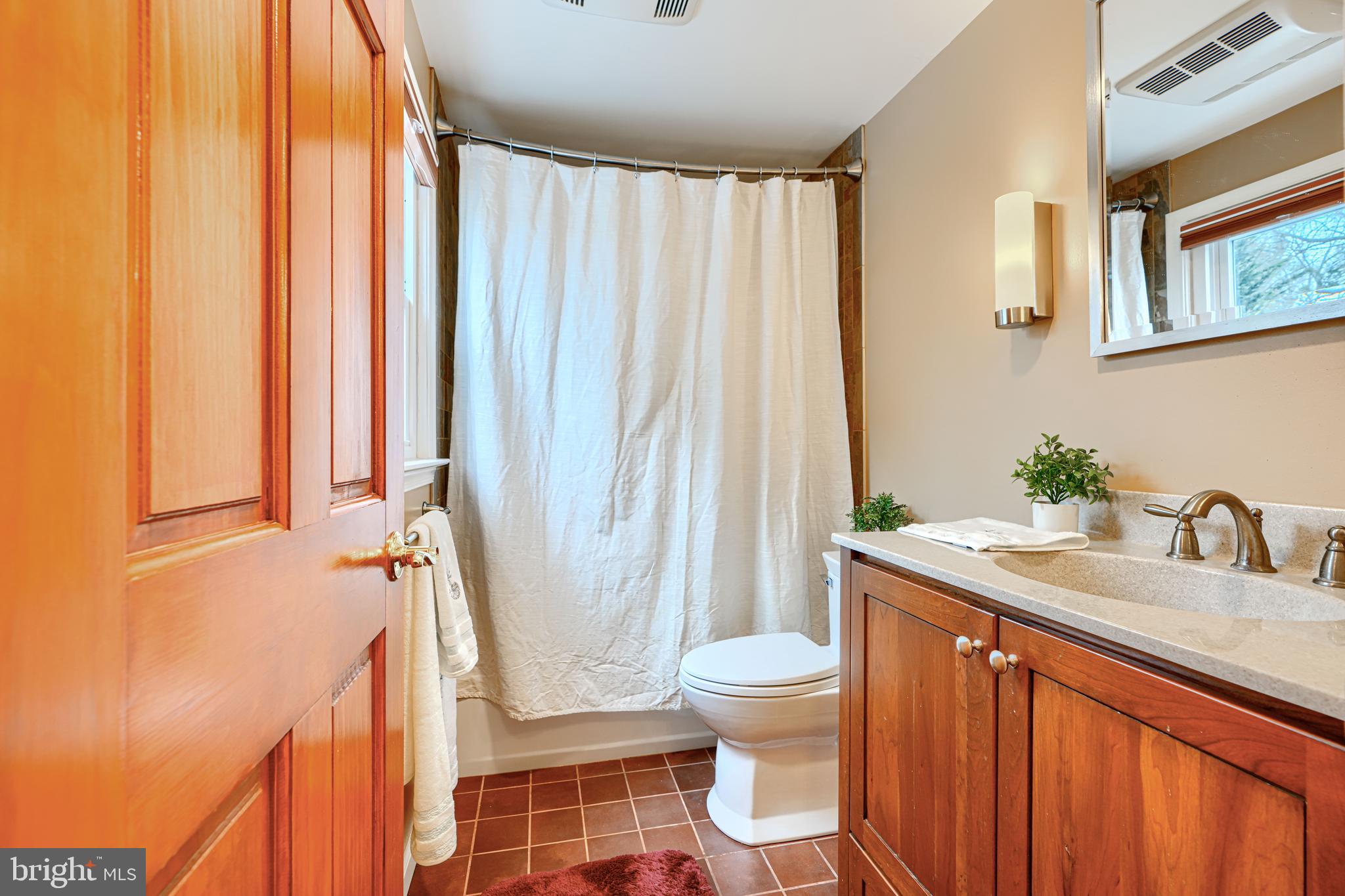 1202 Vermont Road Bel Air, MD 21014 - Photo 51 of 66 a bathroom with a granite countertop sink toilet and shower