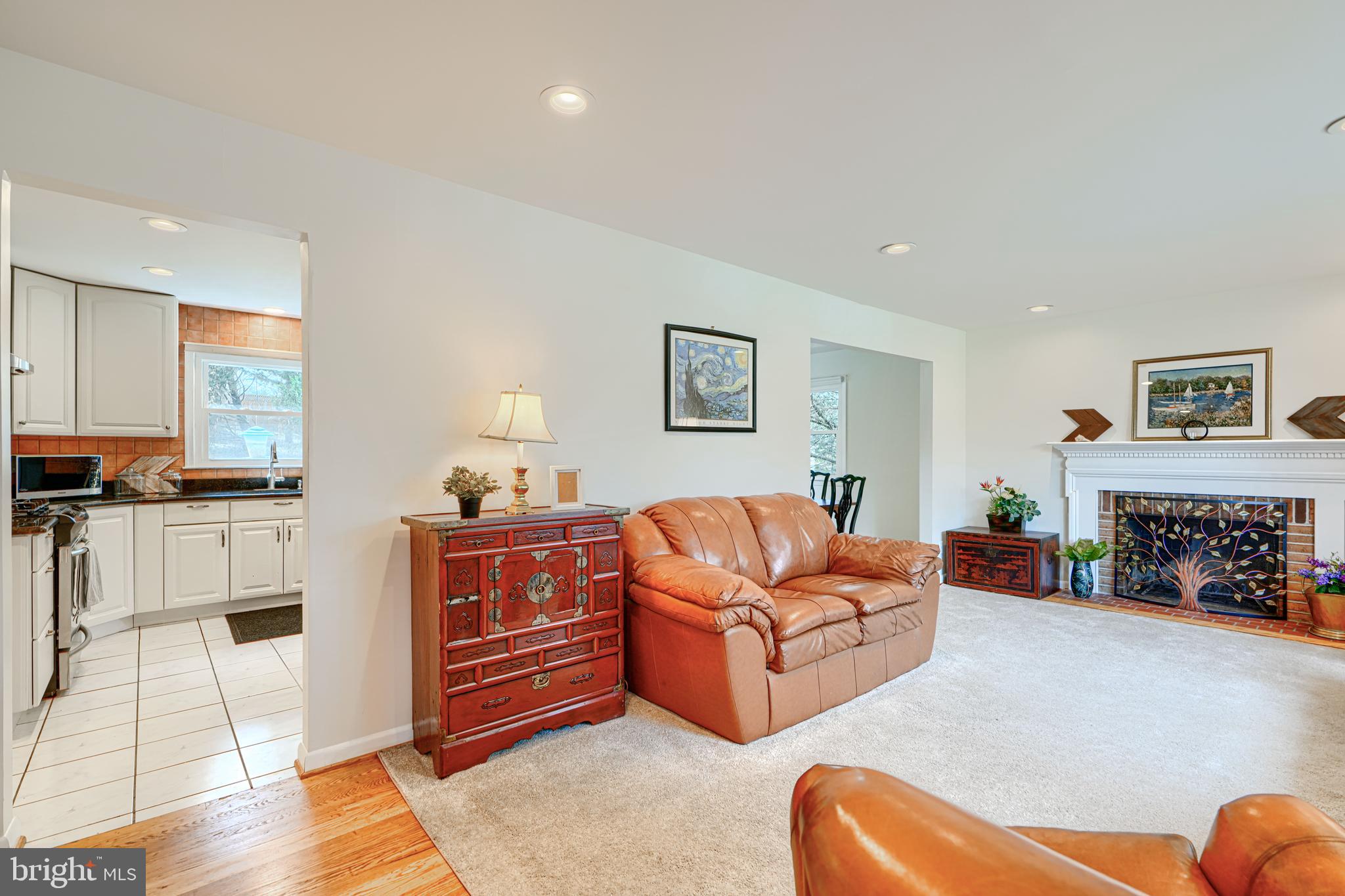 1202 Vermont Road Bel Air, MD 21014 - Photo 6 of 66 a living room with furniture fireplace and flat screen tv