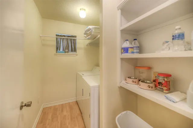 a bathroom with a sink toilet and vanity