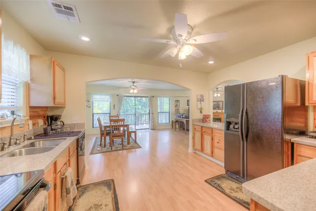a very nice looking kitchen with a large window
