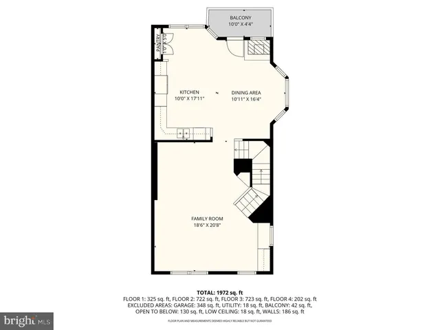 a front view of a house with a garden and parking