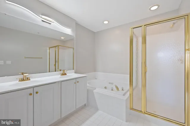 an empty room with windows and entryway