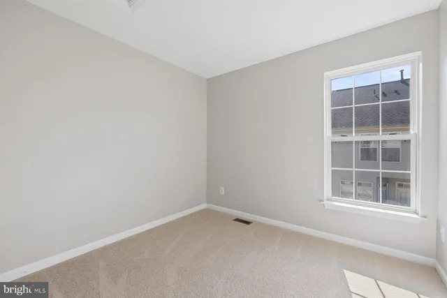a bathroom with a toilet a sink a tub and mirror