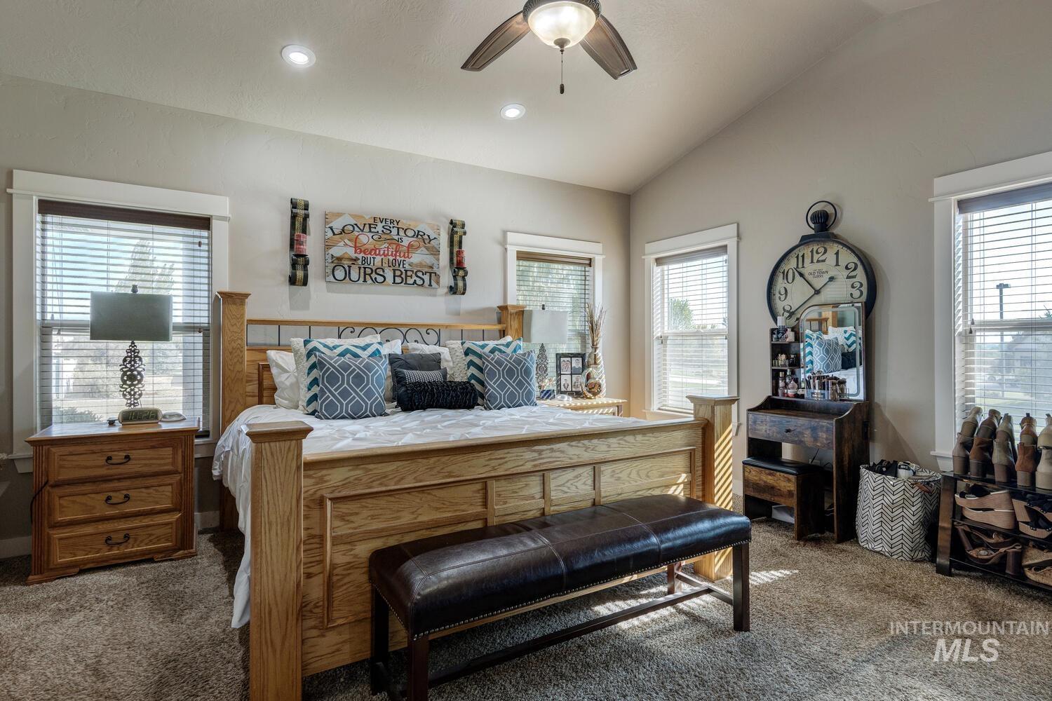 22757 Rosicky Way Caldwell, ID 83607 - Photo 18 of 50 Bedroom featuring dark colored carpet, lofted ceiling, a ceiling fan, and recessed lighting