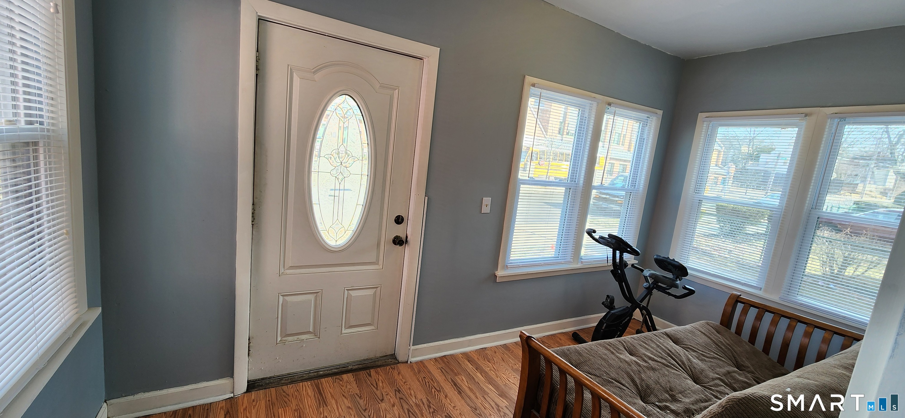 52 Davis Street New Haven, CT 06515 - Photo 3 of 35 a view of a hallway with wooden floor and windows