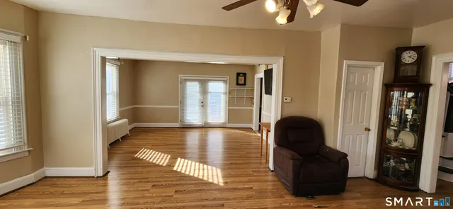 a view of livingroom with furniture and wooden floor