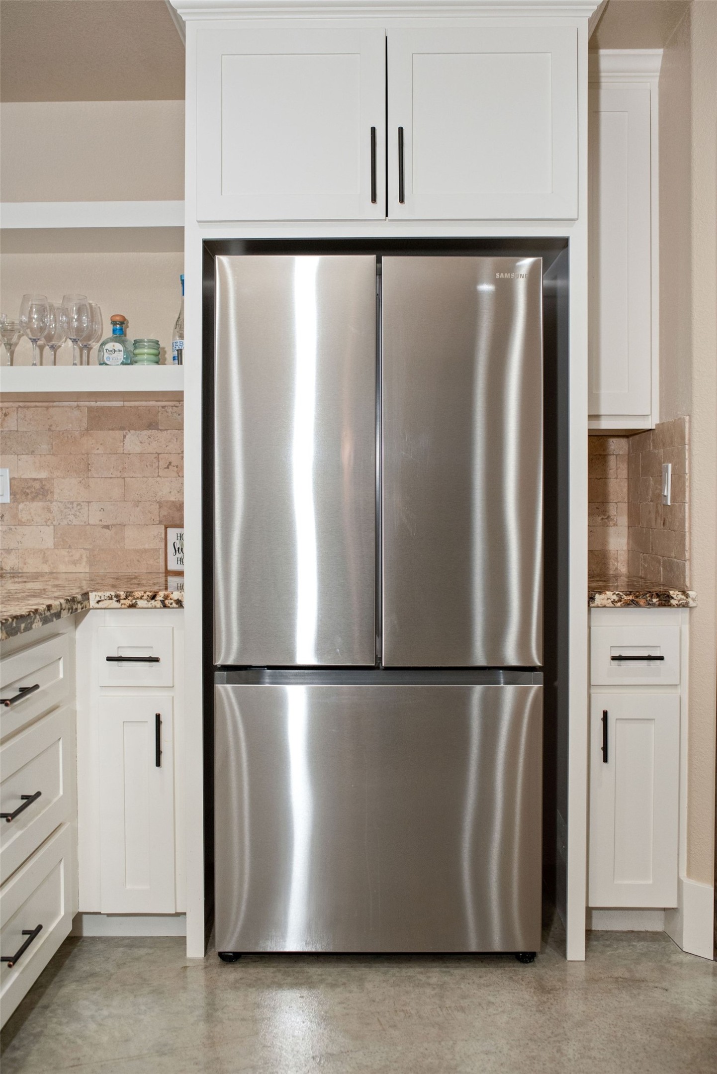 82 Circle Hook Port O'Connor, TX 77982 - Photo 11 of 32 a view of a refrigerator in kitchen and a refrigerator