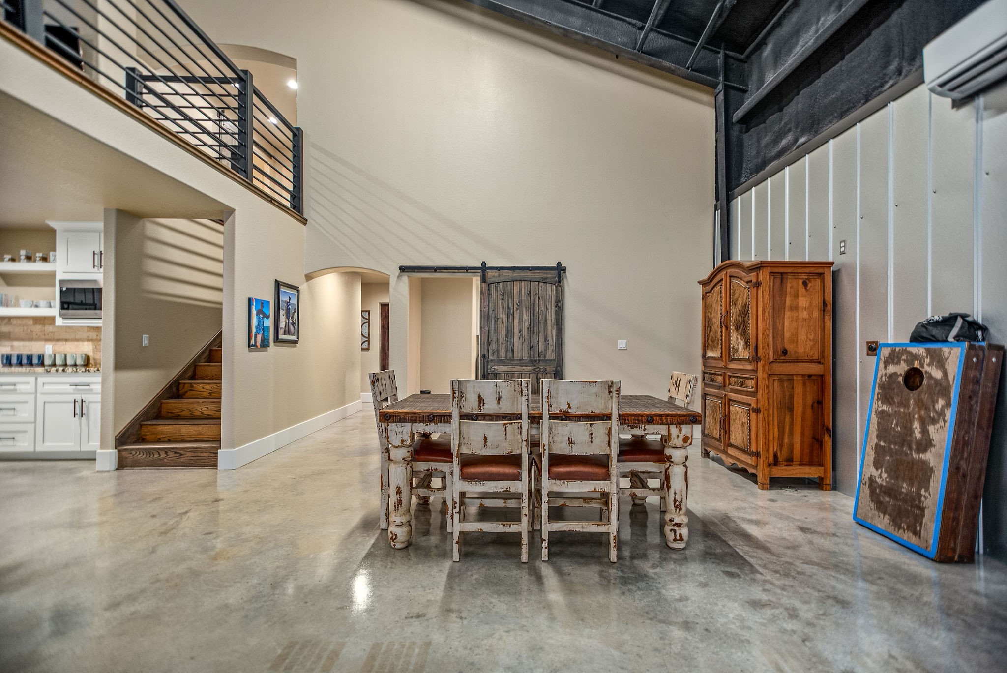 82 Circle Hook Port O'Connor, TX 77982 - Photo 16 of 32 a dining room with furniture and wooden floor