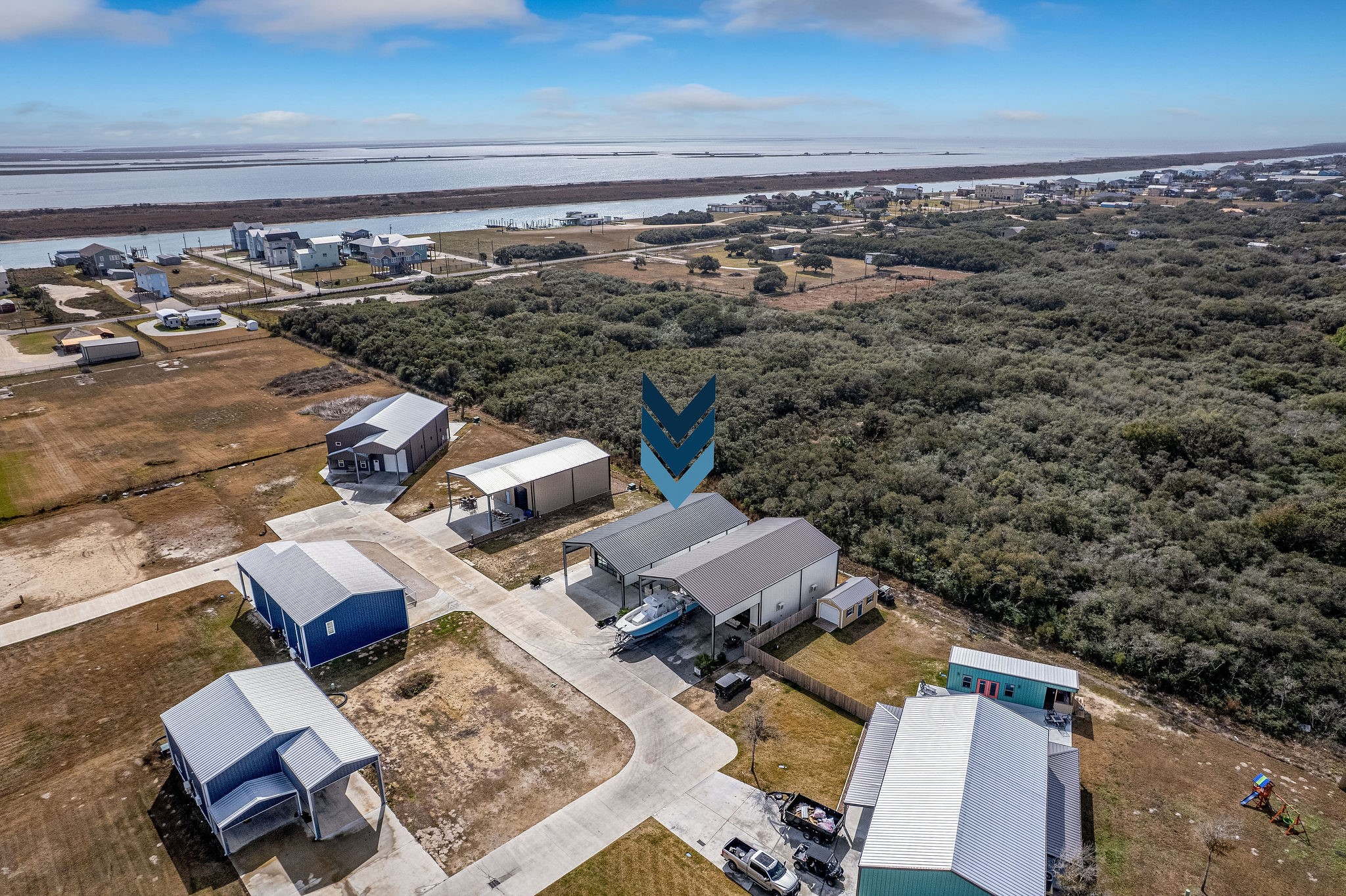 82 Circle Hook Port O'Connor, TX 77982 - Photo 3 of 32 an aerial view of multiple house