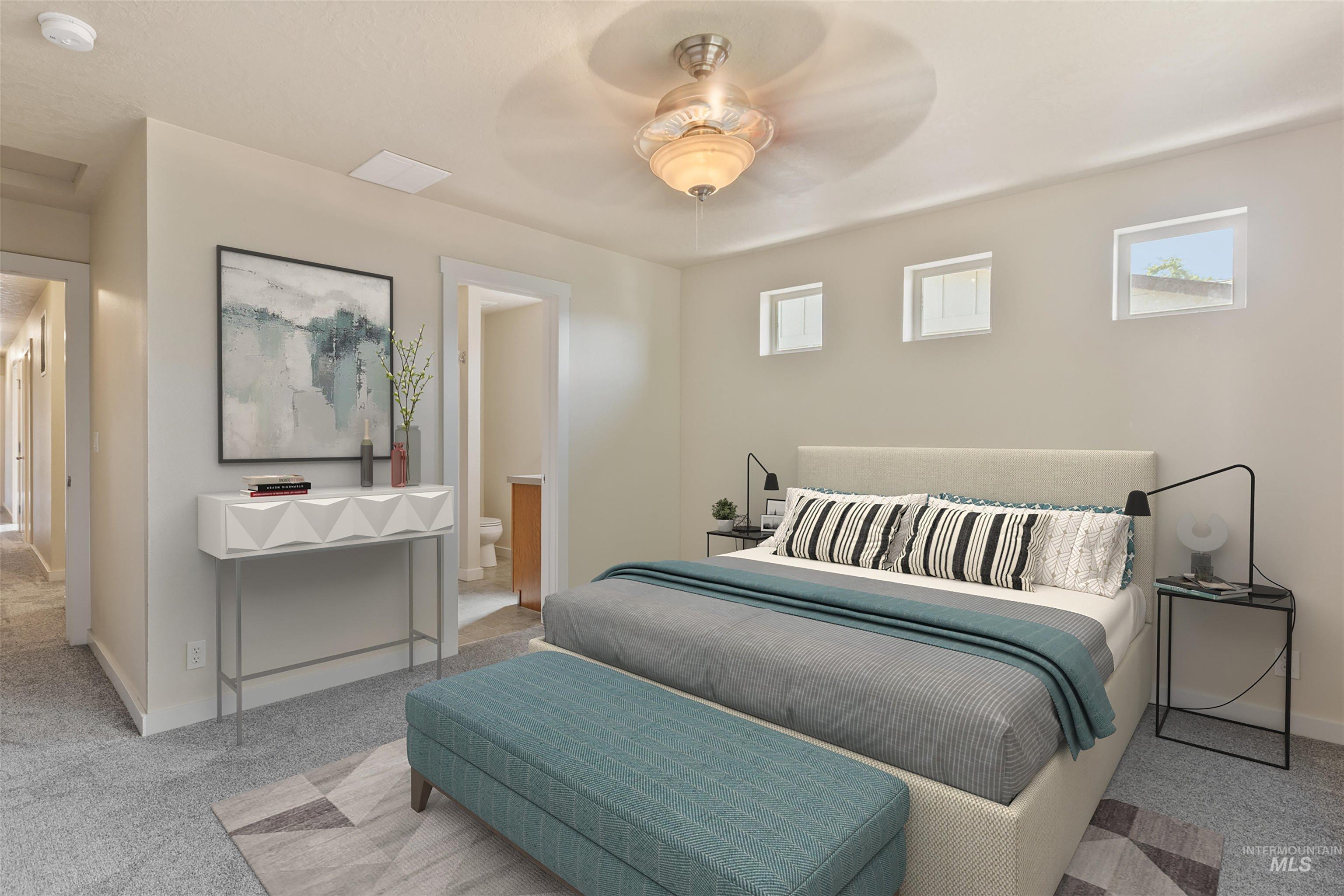 2209 South Amy Avenue Boise, ID 83706 - Photo 17 of 30 Bedroom with carpet, ceiling fan, and ensuite bath