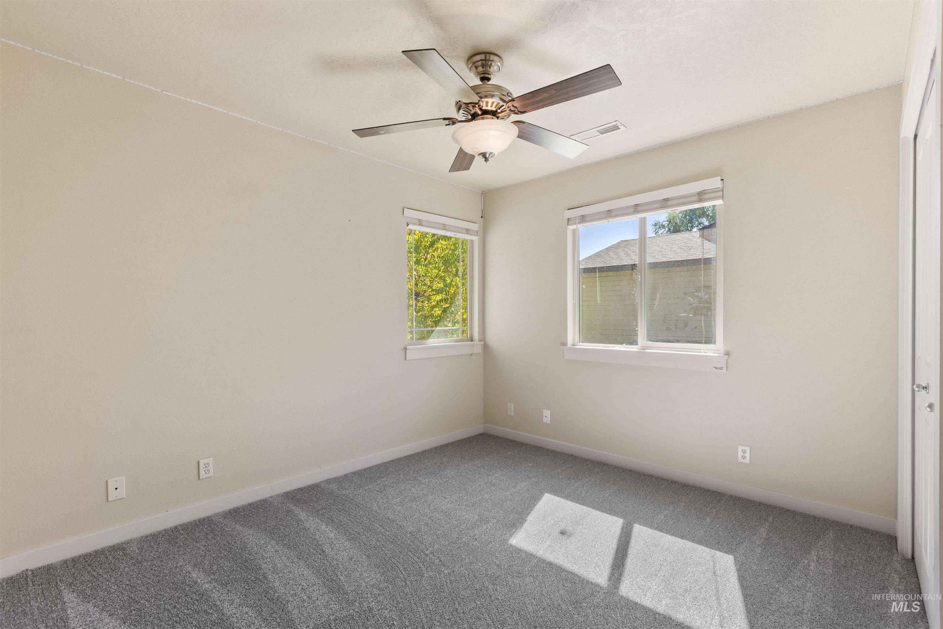 2209 South Amy Avenue Boise, ID 83706 - Photo 25 of 30 Unfurnished room with carpet floors and a ceiling fan