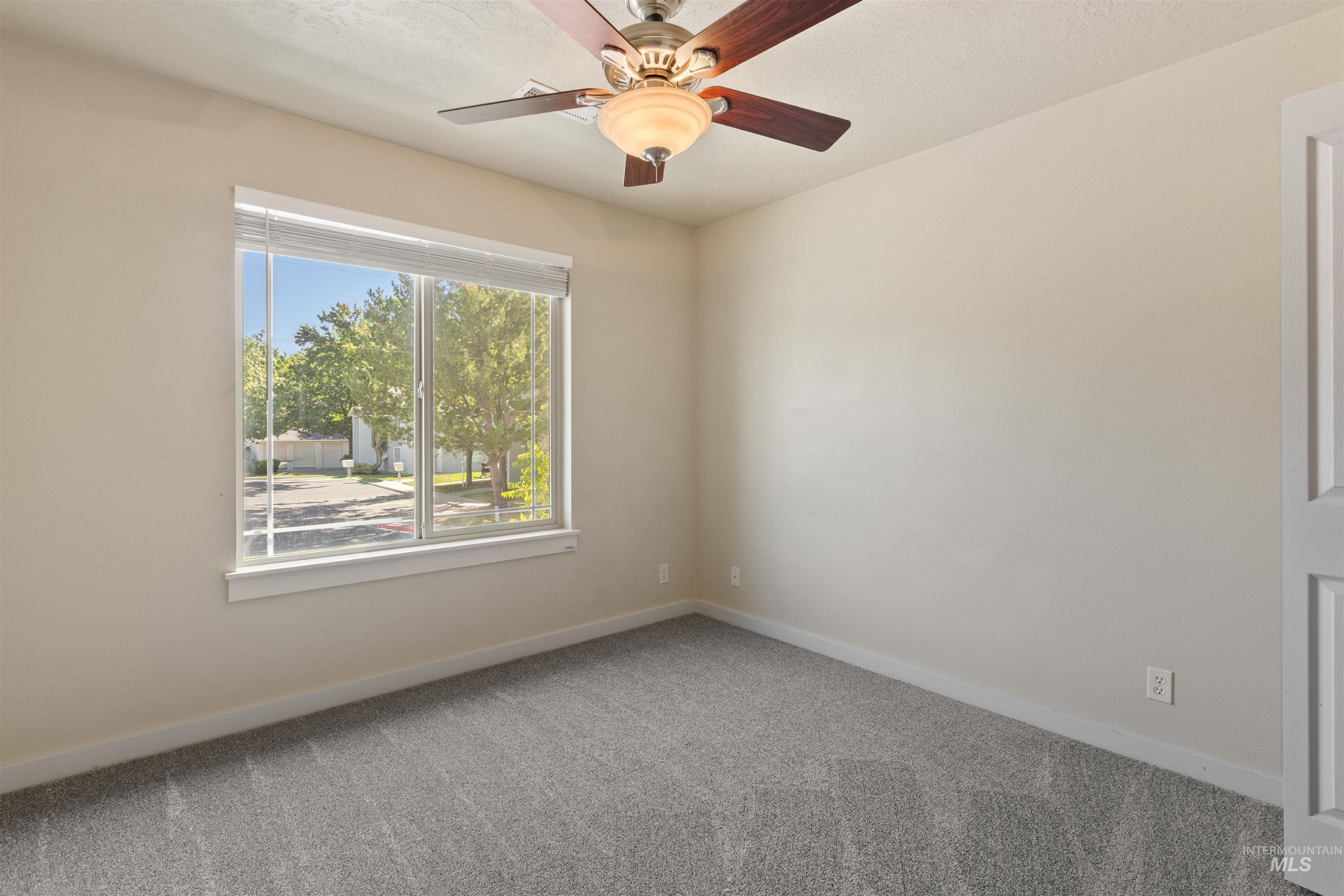 2209 South Amy Avenue Boise, ID 83706 - Photo 26 of 30 Empty room featuring carpet flooring and ceiling fan