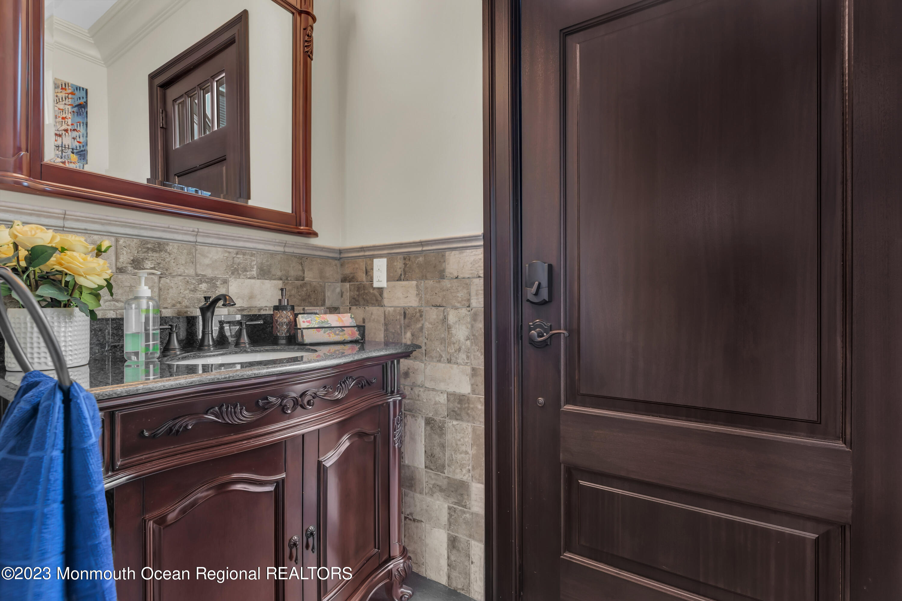 502 Brighton Avenue Spring Lake, NJ 07762 - Photo 12 of 78 a kitchen with stainless steel appliances granite countertop white cabinets and a window