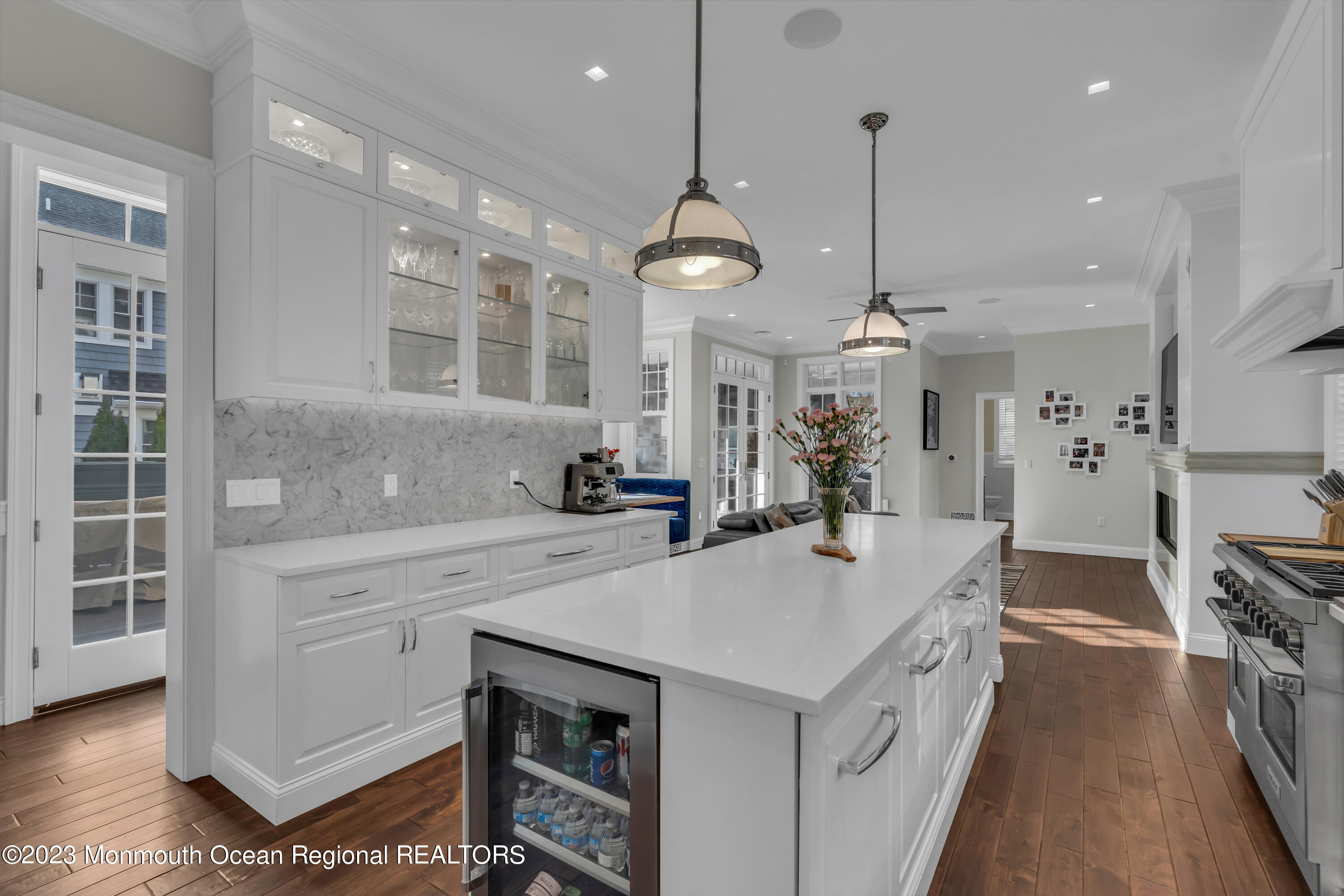 502 Brighton Avenue Spring Lake, NJ 07762 - Photo 15 of 78 a large kitchen with kitchen island a large counter space a sink appliances and cabinets