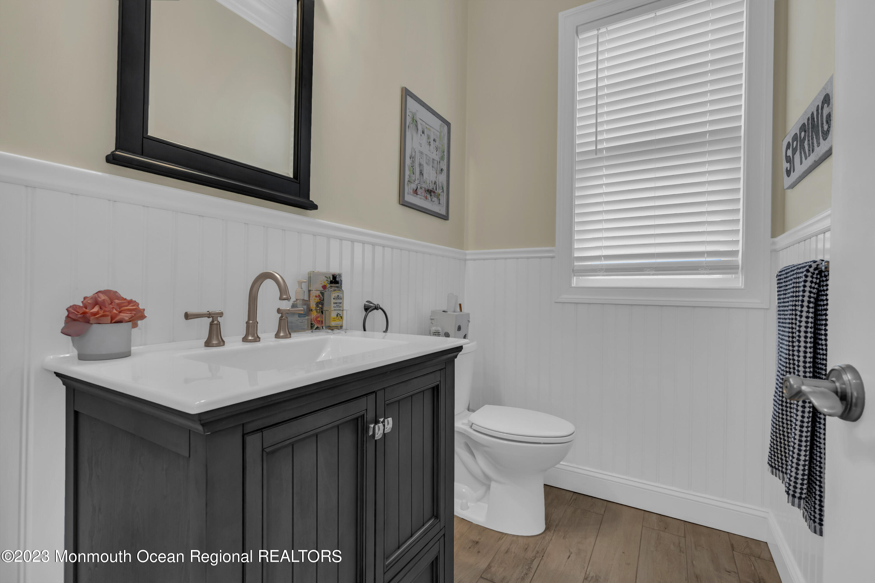 502 Brighton Avenue Spring Lake, NJ 07762 - Photo 23 of 78 a bathroom with a sink and a toilet