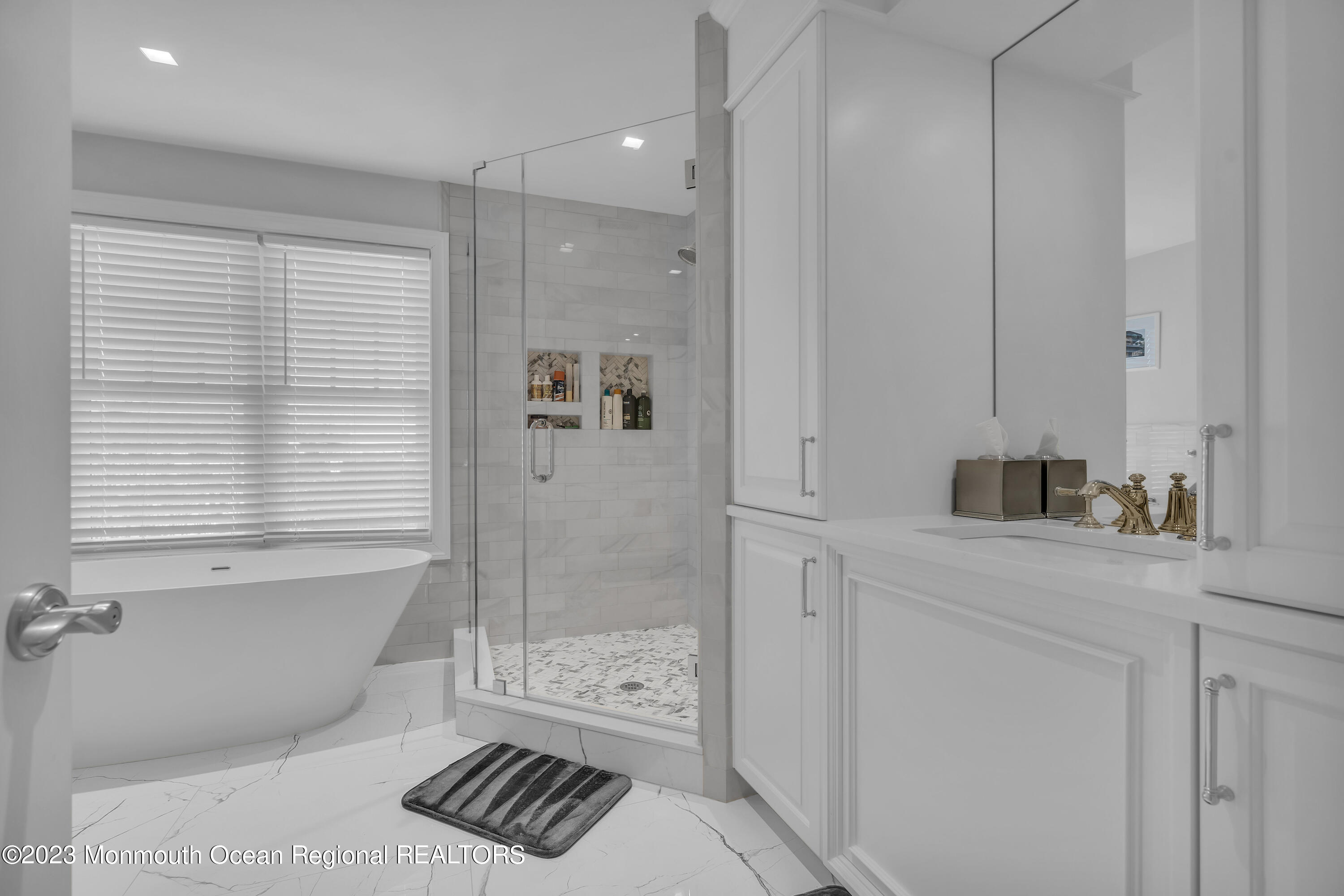 502 Brighton Avenue Spring Lake, NJ 07762 - Photo 36 of 78 a bathroom with a bathtub and shower
