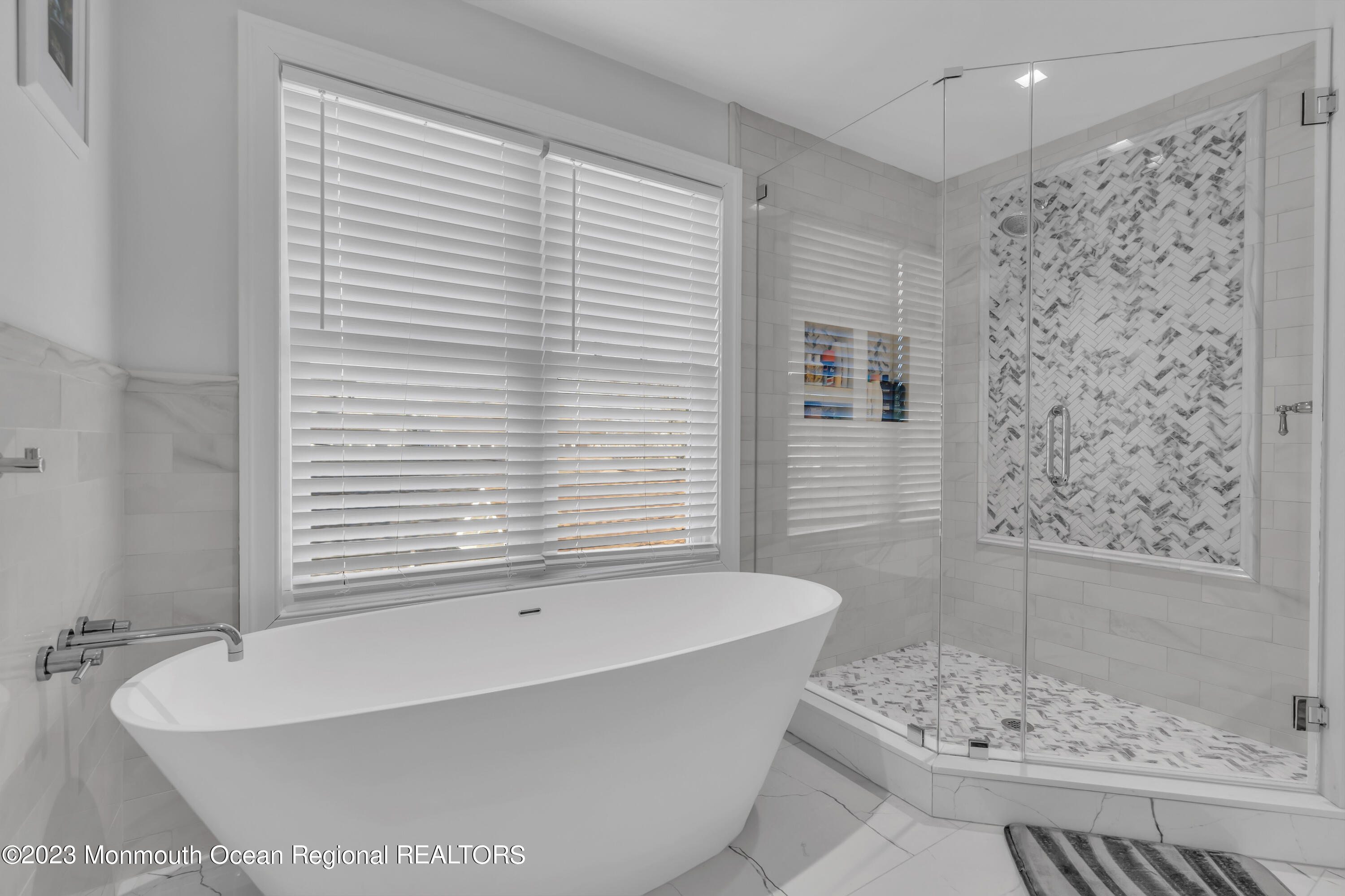 502 Brighton Avenue Spring Lake, NJ 07762 - Photo 38 of 78 a bathroom with a bathtub and shower