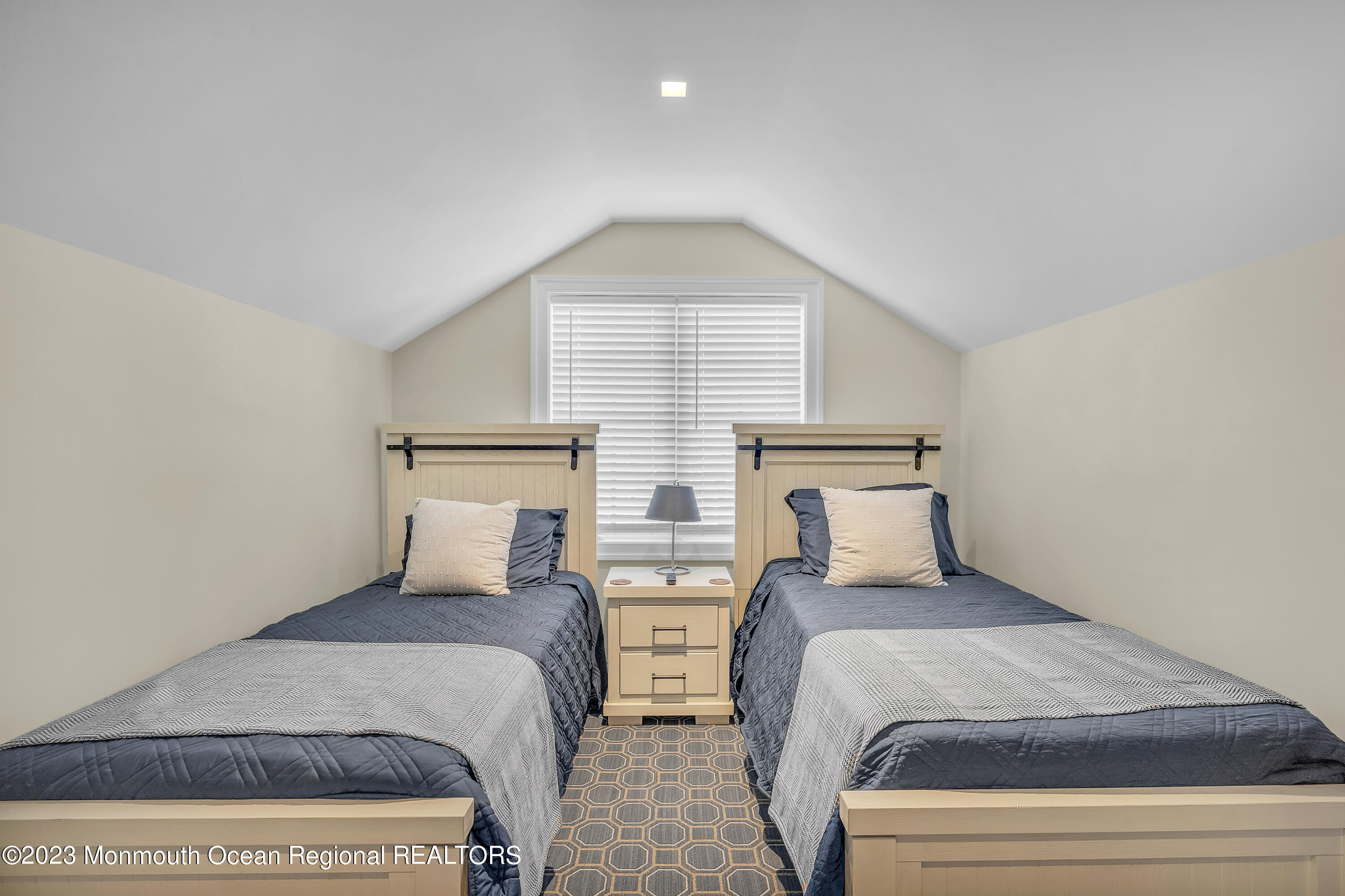 502 Brighton Avenue Spring Lake, NJ 07762 - Photo 43 of 78 a bedroom with two beds and a window