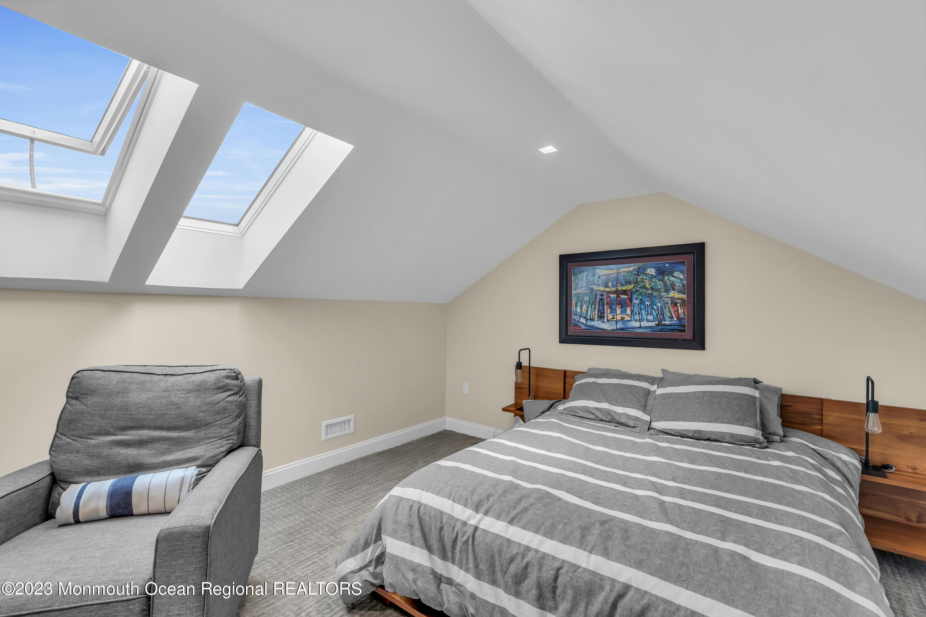 502 Brighton Avenue Spring Lake, NJ 07762 - Photo 49 of 78 a bedroom with bed and a couch