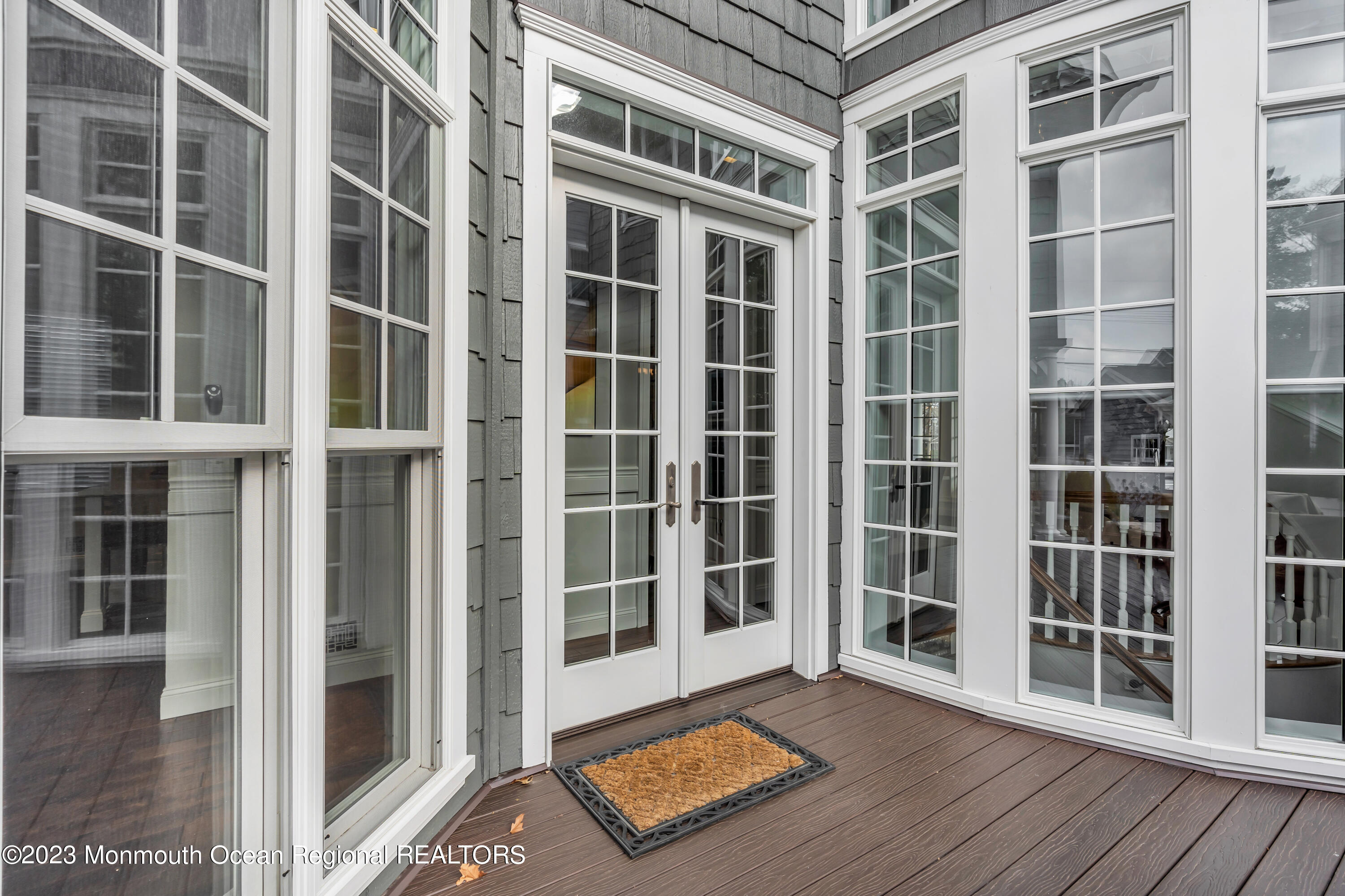 502 Brighton Avenue Spring Lake, NJ 07762 - Photo 66 of 78 a view of front door with wooden floor and windows