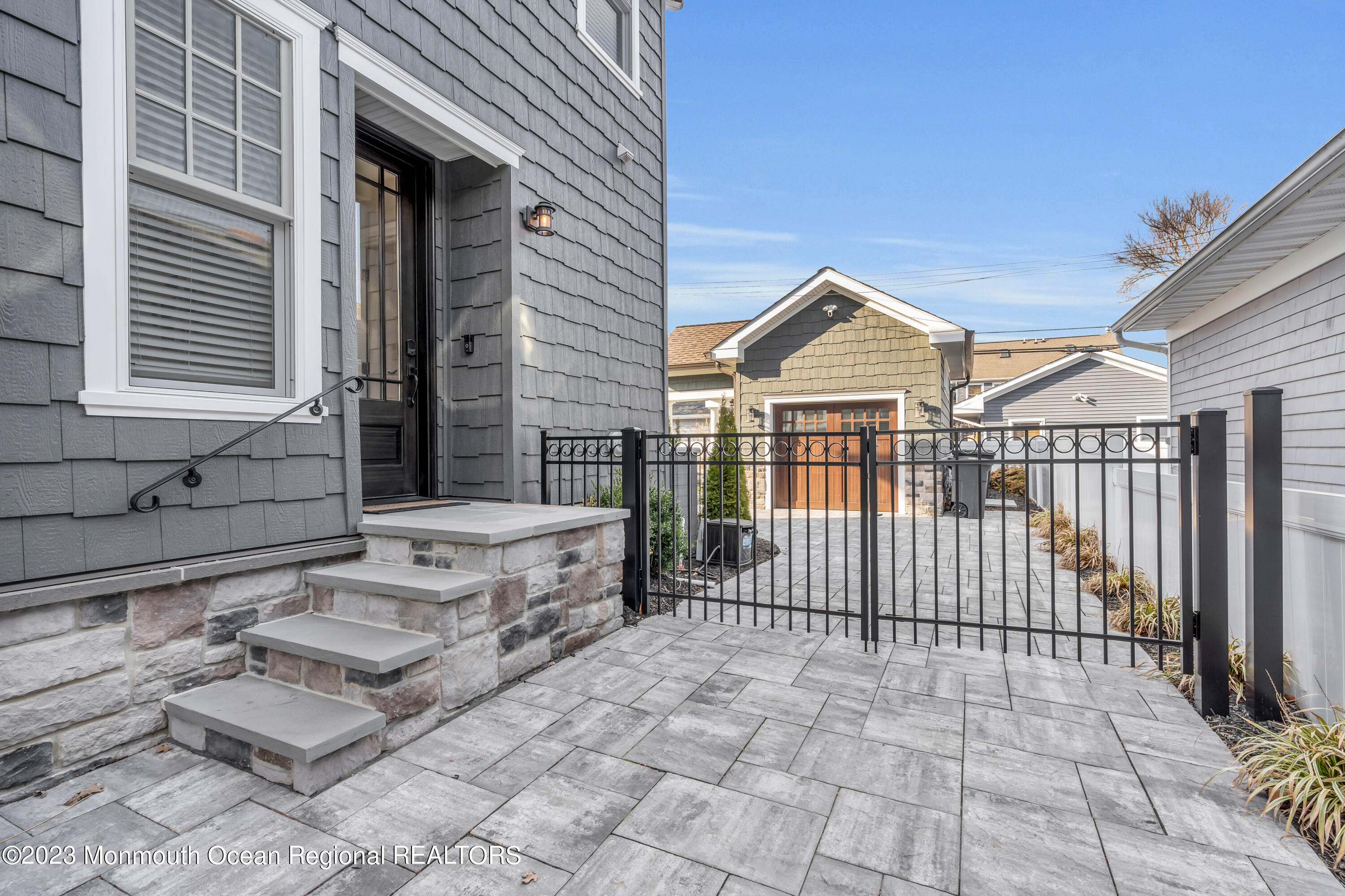 502 Brighton Avenue Spring Lake, NJ 07762 - Photo 72 of 78 a view of a brick house with large windows