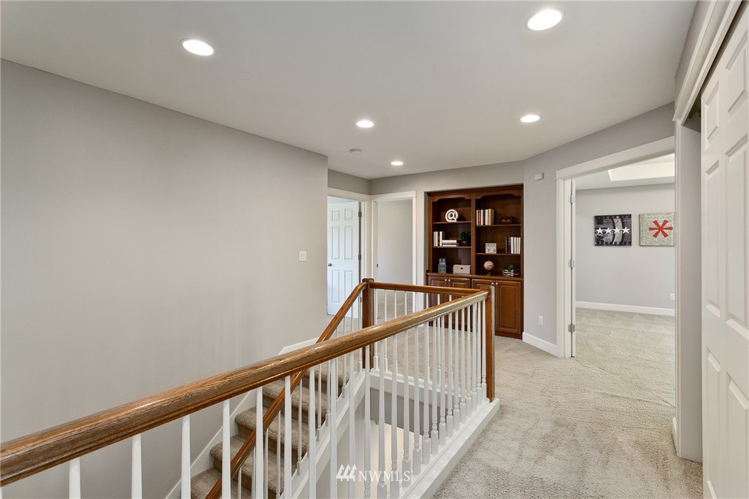 718 South 36th Place Renton, WA 98055 - Photo 17 of 40 a view of hallway with stairs
