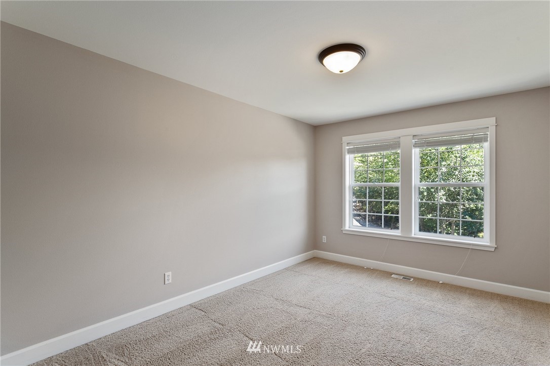 718 South 36th Place Renton, WA 98055 - Photo 28 of 40 an empty room with a window