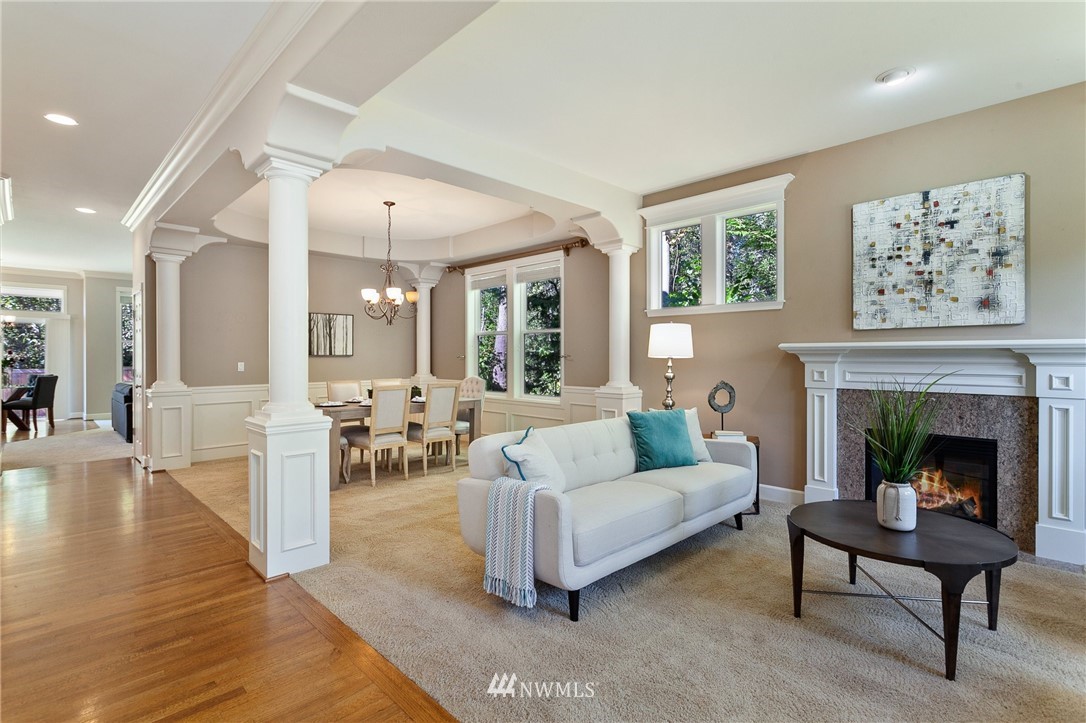 718 South 36th Place Renton, WA 98055 - Photo 4 of 40 a living room with furniture and a fireplace