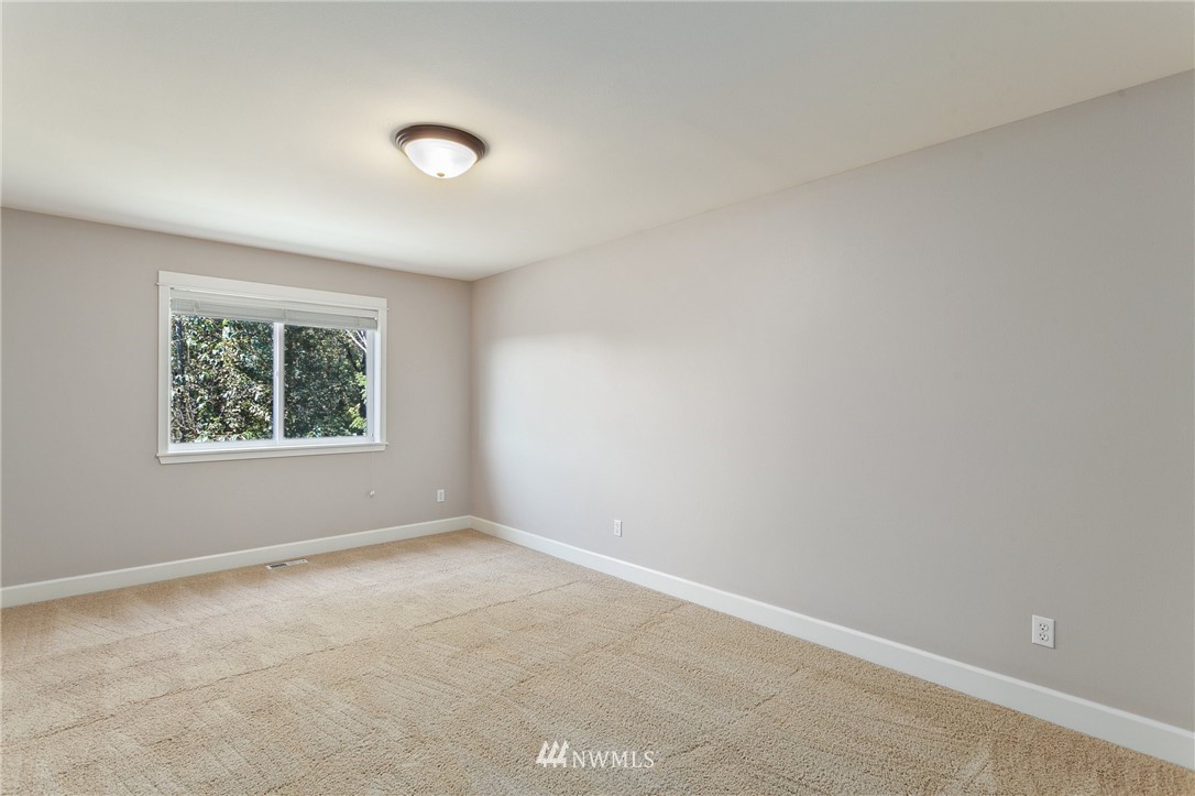 718 South 36th Place Renton, WA 98055 - Photo 32 of 40 an empty room with windows