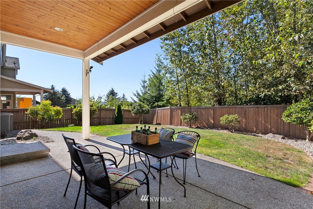 718 South 36th Place Renton, WA 98055 - Photo 36 of 40 a view of an chairs and table in the patio