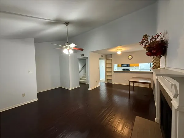 a view of a kitchen and dining room