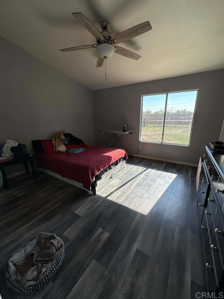 952 Alameda Street Calexico, CA 92231 - Photo 6 of 7 a bedroom with a bed next to a window