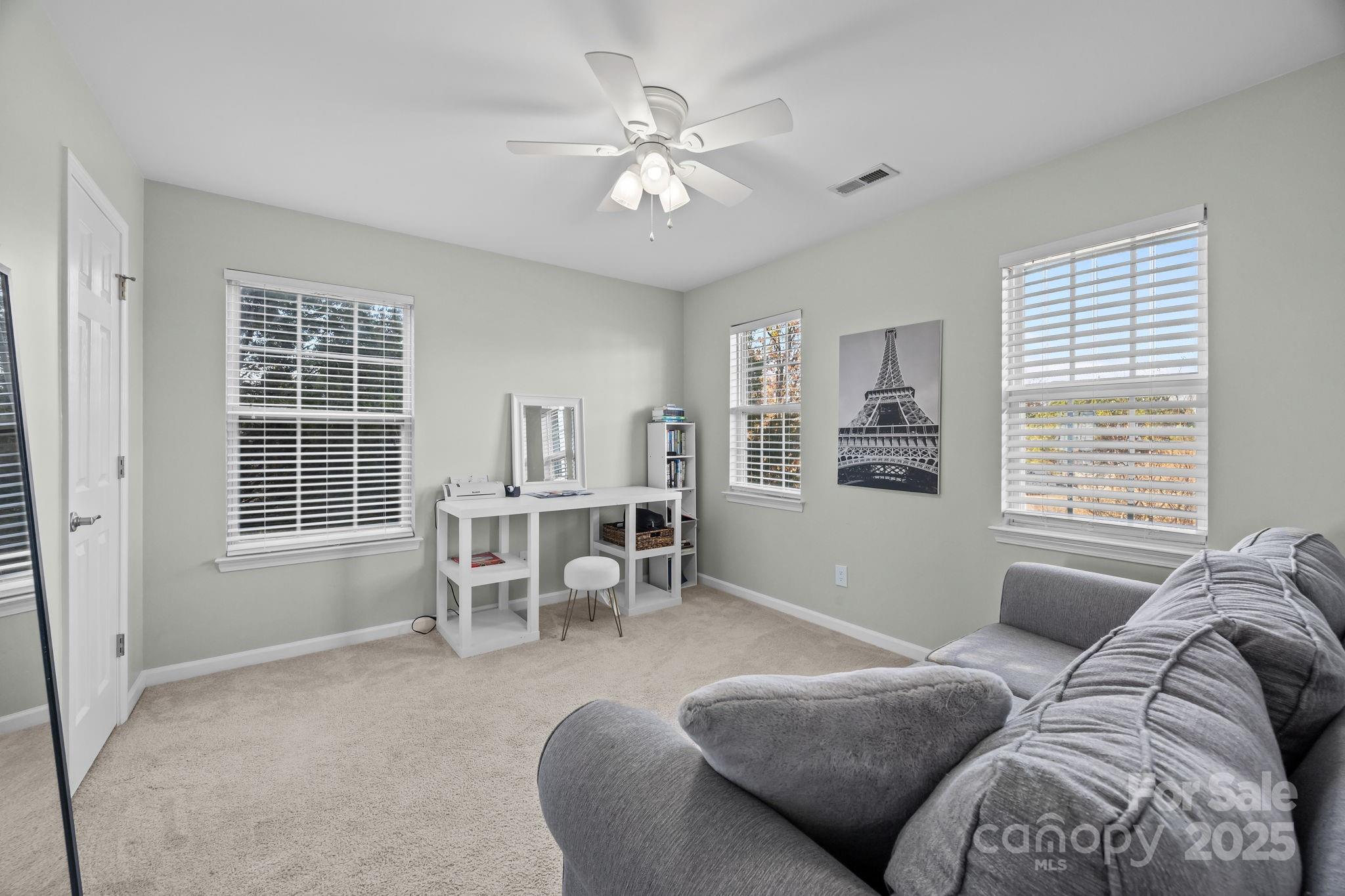 135 Shade Tree Circle Fort Mill, SC 29715 - Photo 21 of 34 a living room with furniture and a large window