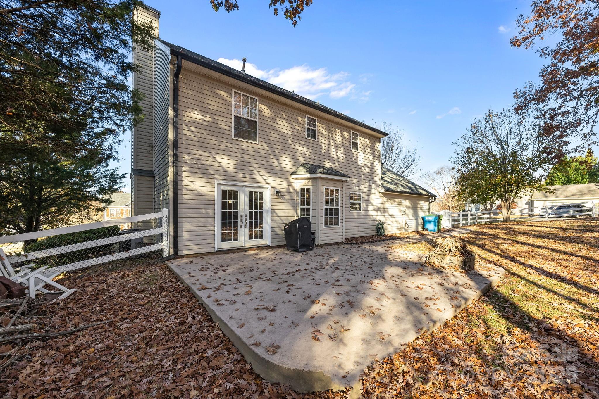 135 Shade Tree Circle Fort Mill, SC 29715 - Photo 25 of 34 a view of a house with a backyard