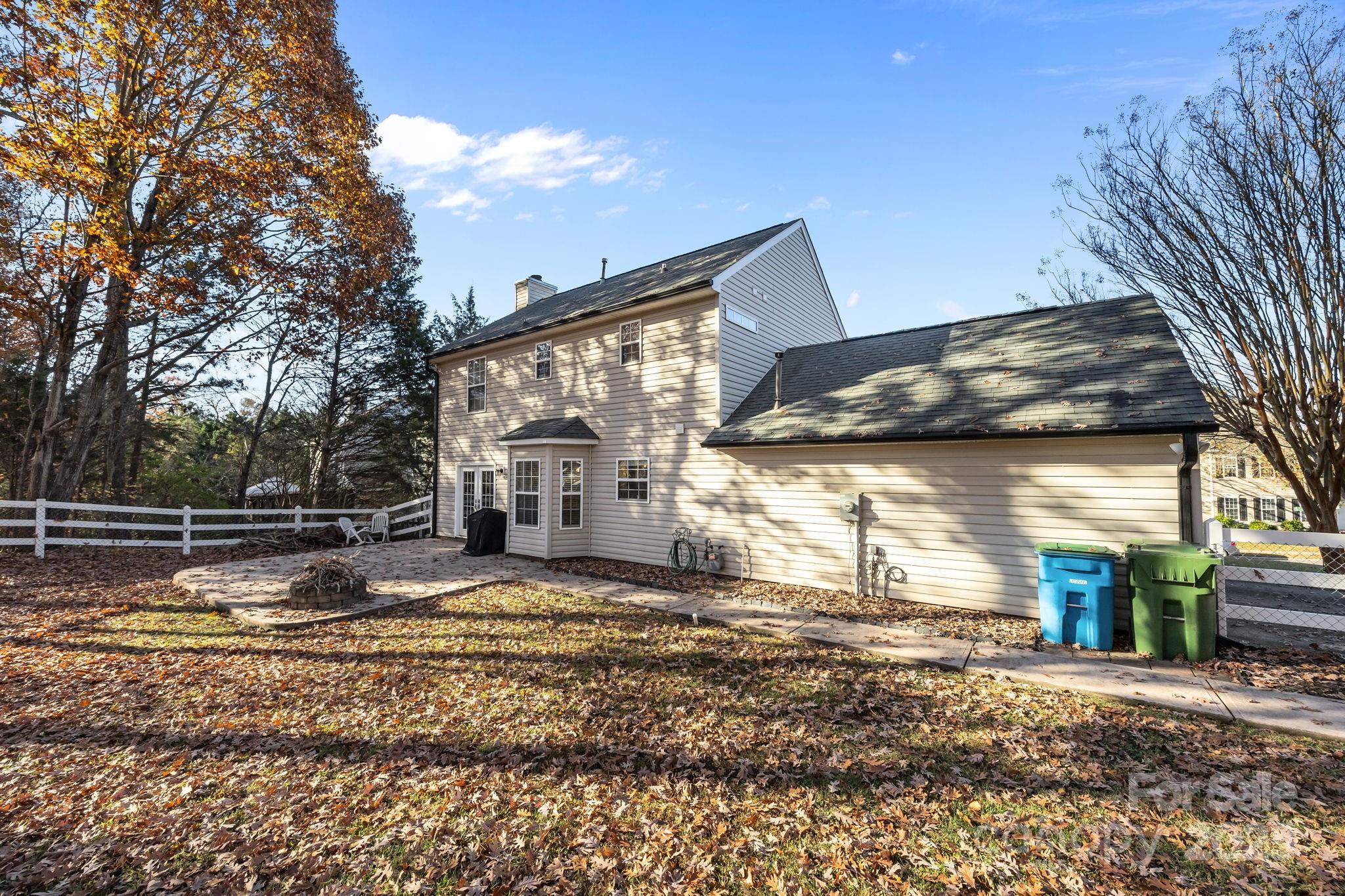 135 Shade Tree Circle Fort Mill, SC 29715 - Photo 28 of 34 a view of a house with a yard