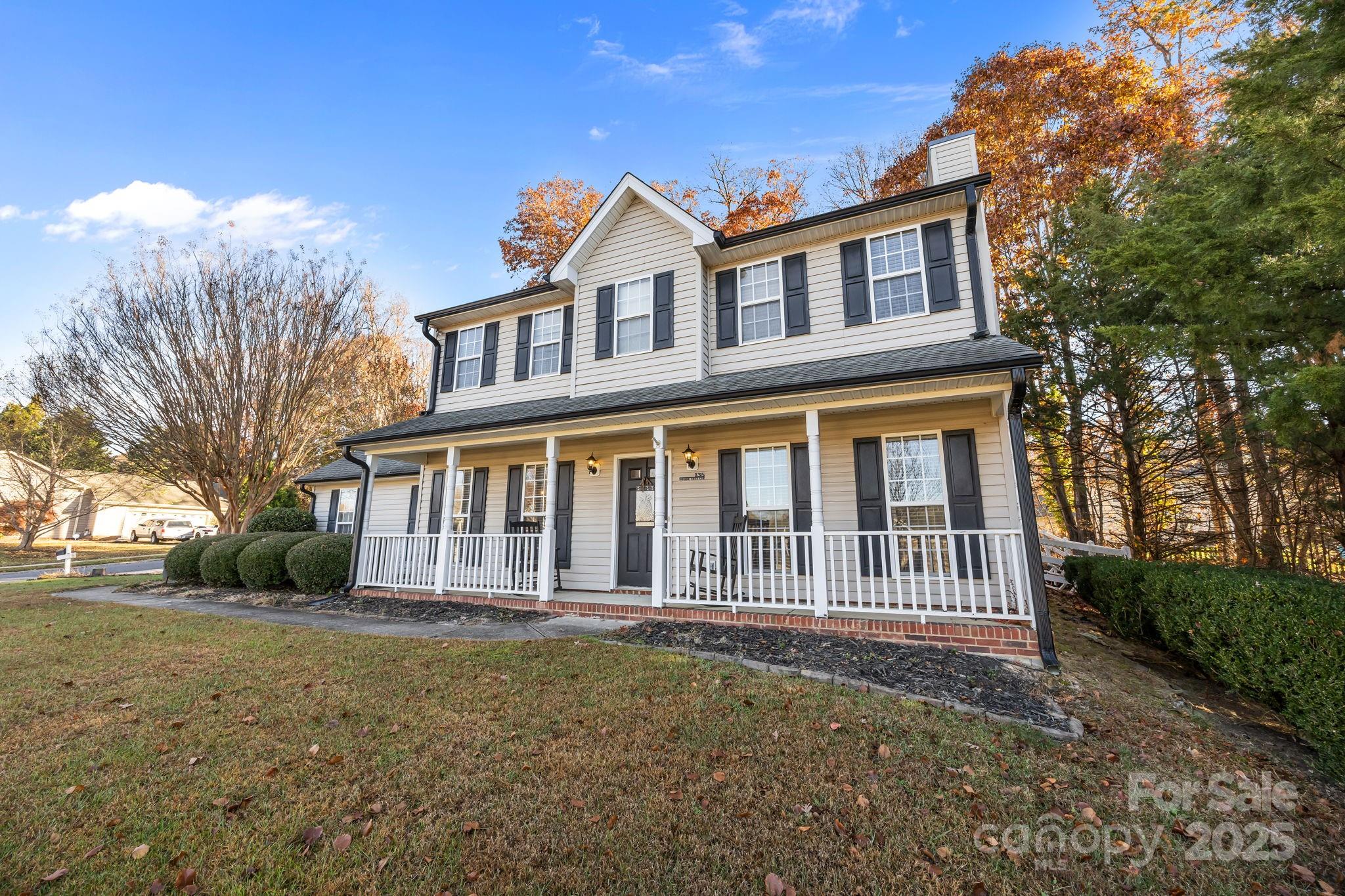 135 Shade Tree Circle Fort Mill, SC 29715 - Photo 33 of 34 a front view of a house with a yard