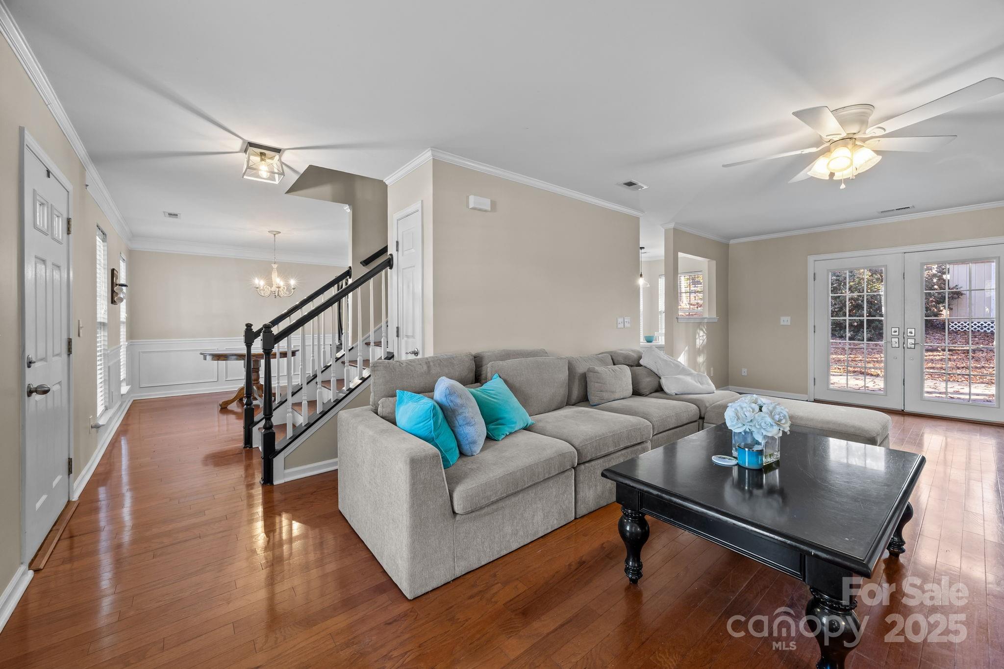 135 Shade Tree Circle Fort Mill, SC 29715 - Photo 4 of 34 a living room with furniture and wooden floor