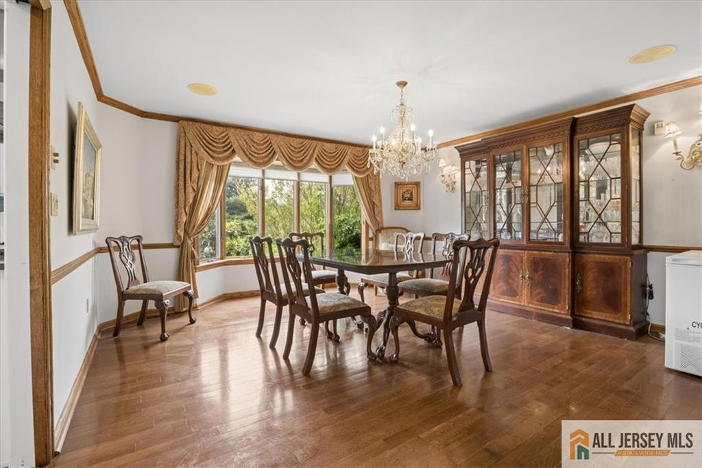 167 Federal Road Monroe Township, NJ 08831 - Photo 8 of 46 a view of a dining room with furniture window and wooden floor