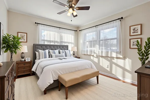 a bedroom with a large bed and a large window
