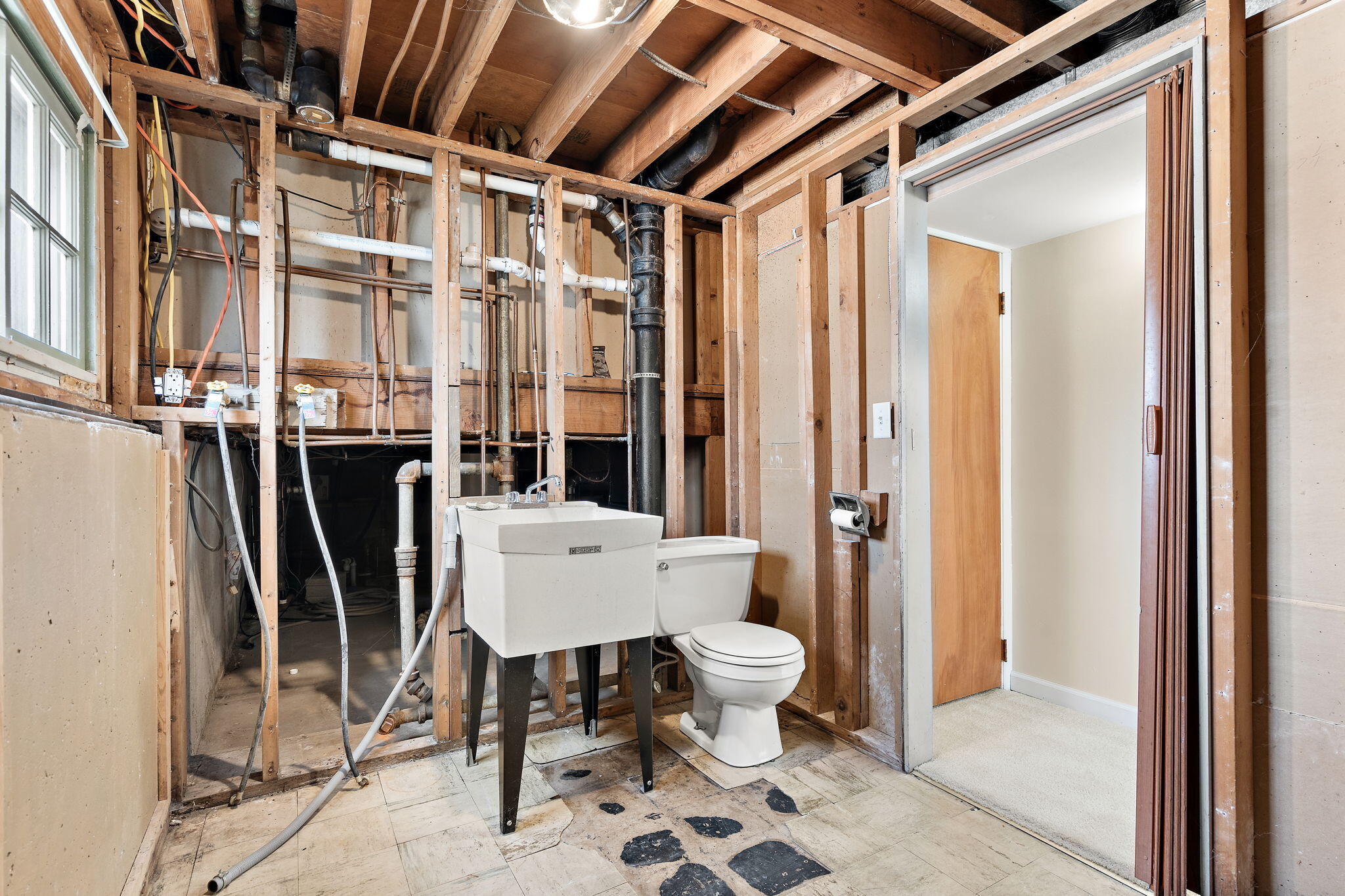8228 Rutledge Street Merrillville, IN 46410 - Photo 24 of 32 a bathroom with a sink toilet and shower