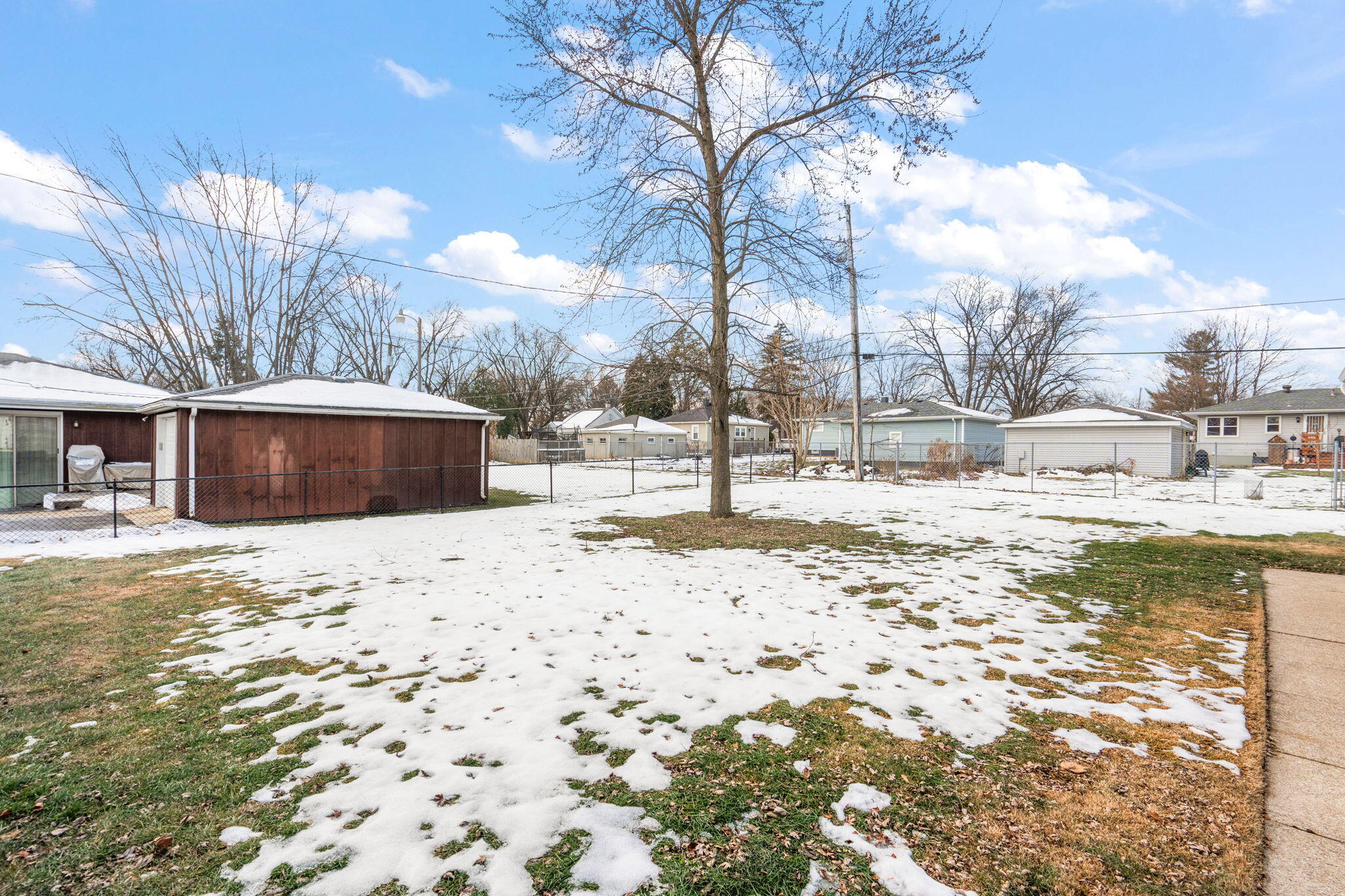 8228 Rutledge Street Merrillville, IN 46410 - Photo 29 of 32 a view of snow on the side of the road