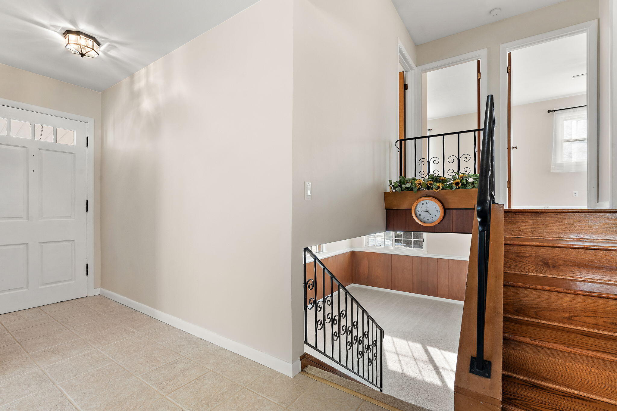 8228 Rutledge Street Merrillville, IN 46410 - Photo 4 of 32 a bedroom with a bed and a window
