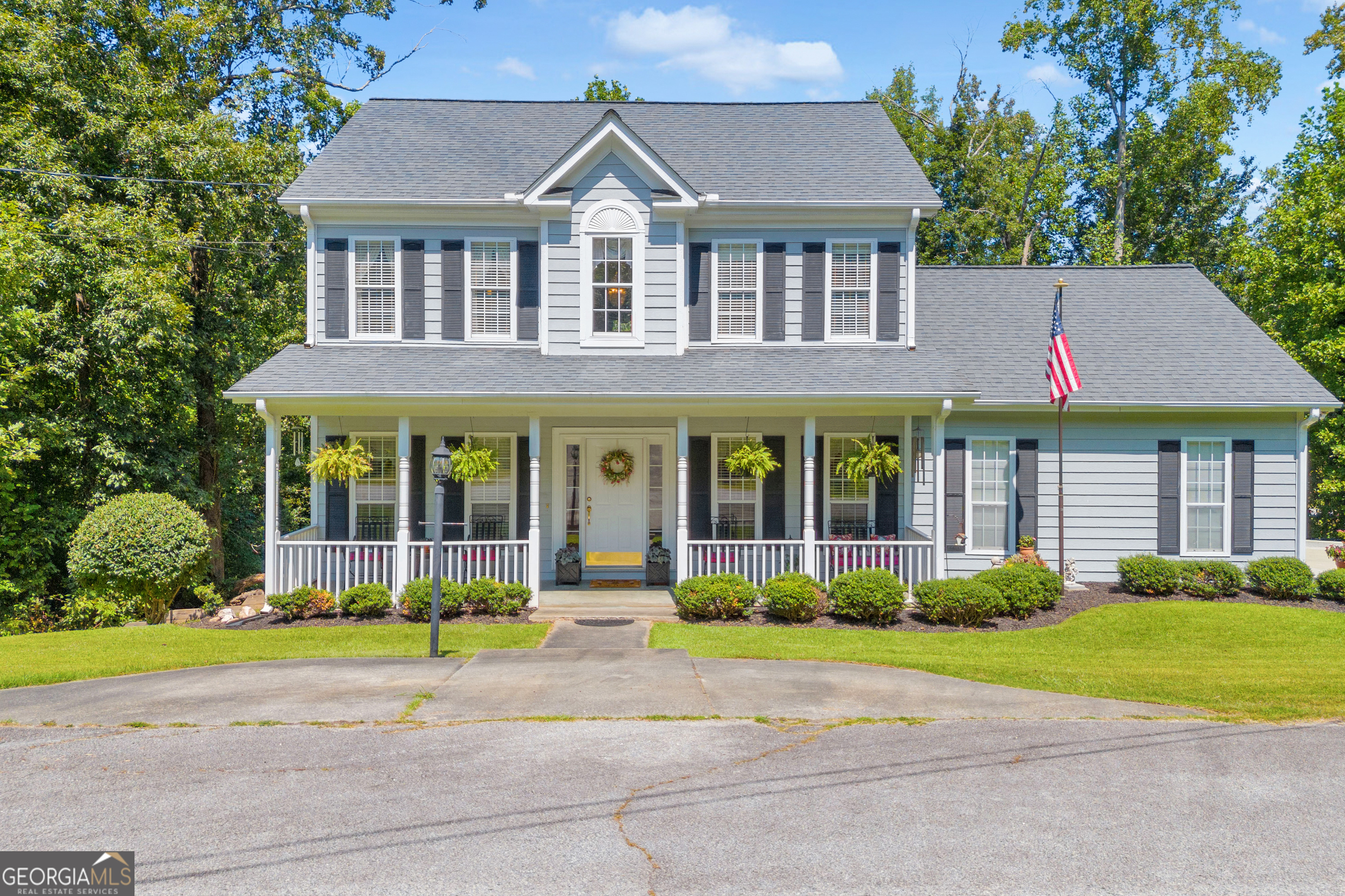 20 Shenandoah Drive Toccoa, GA 30577 - Photo 1 of 62 a front view of a house with garden and plants