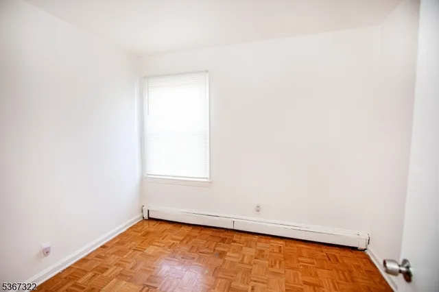 a view of a room with a window