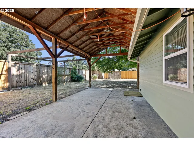 an aerial view of multiple houses with yard