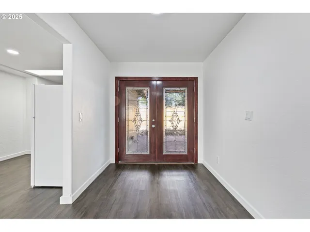 a view interior of a house with wooden floor and windows