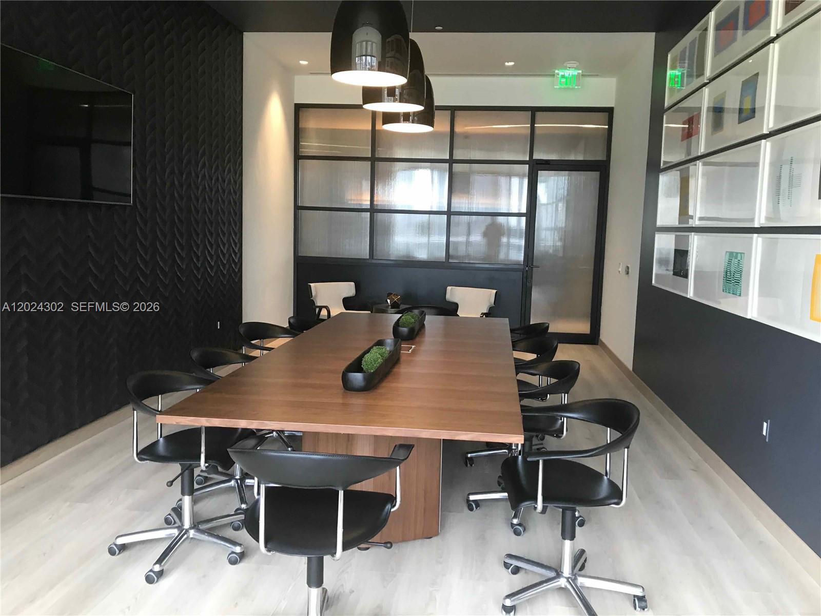 45 Southwest 9th Street, Unit 2109 Miami, FL 33130 - Photo 29 of 40 a view of a workspace with furniture