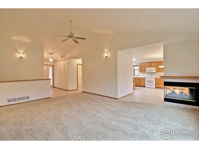 a view of a livingroom with a ceiling fan